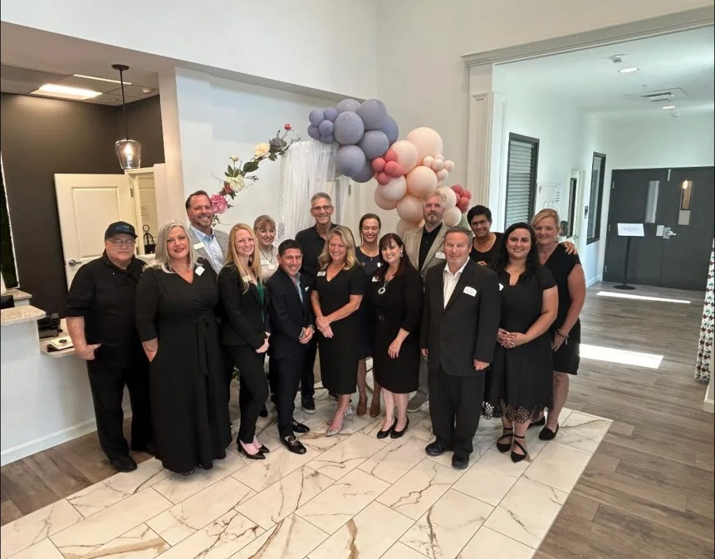 Team Members Celebrate The hearthstone at leesburg grand opening