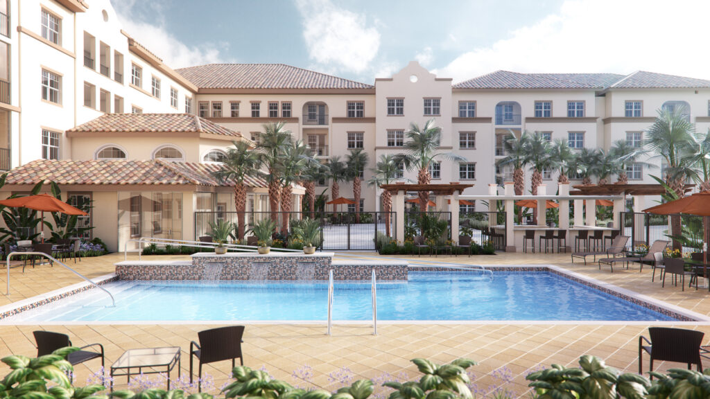 Resort pool area with palm trees, lounge chairs and umbrellas, bordered by beige stucco buildings with terracotta roofs behind.
